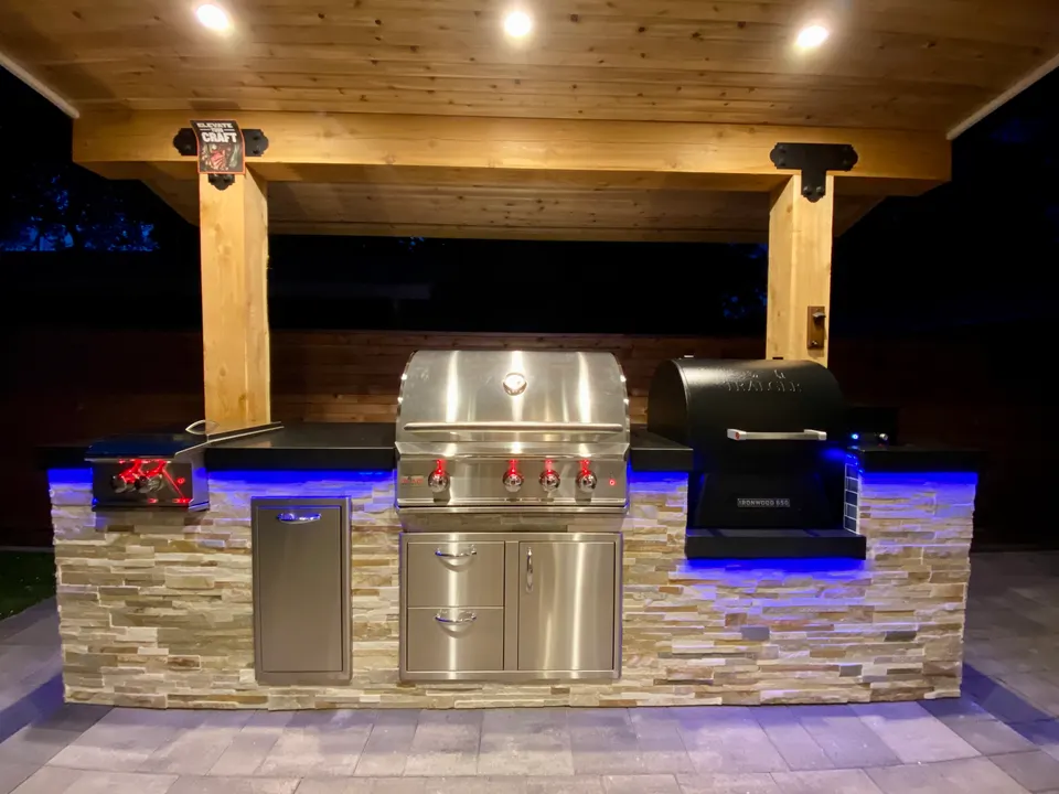 Backyard with outdoor kitchen: after