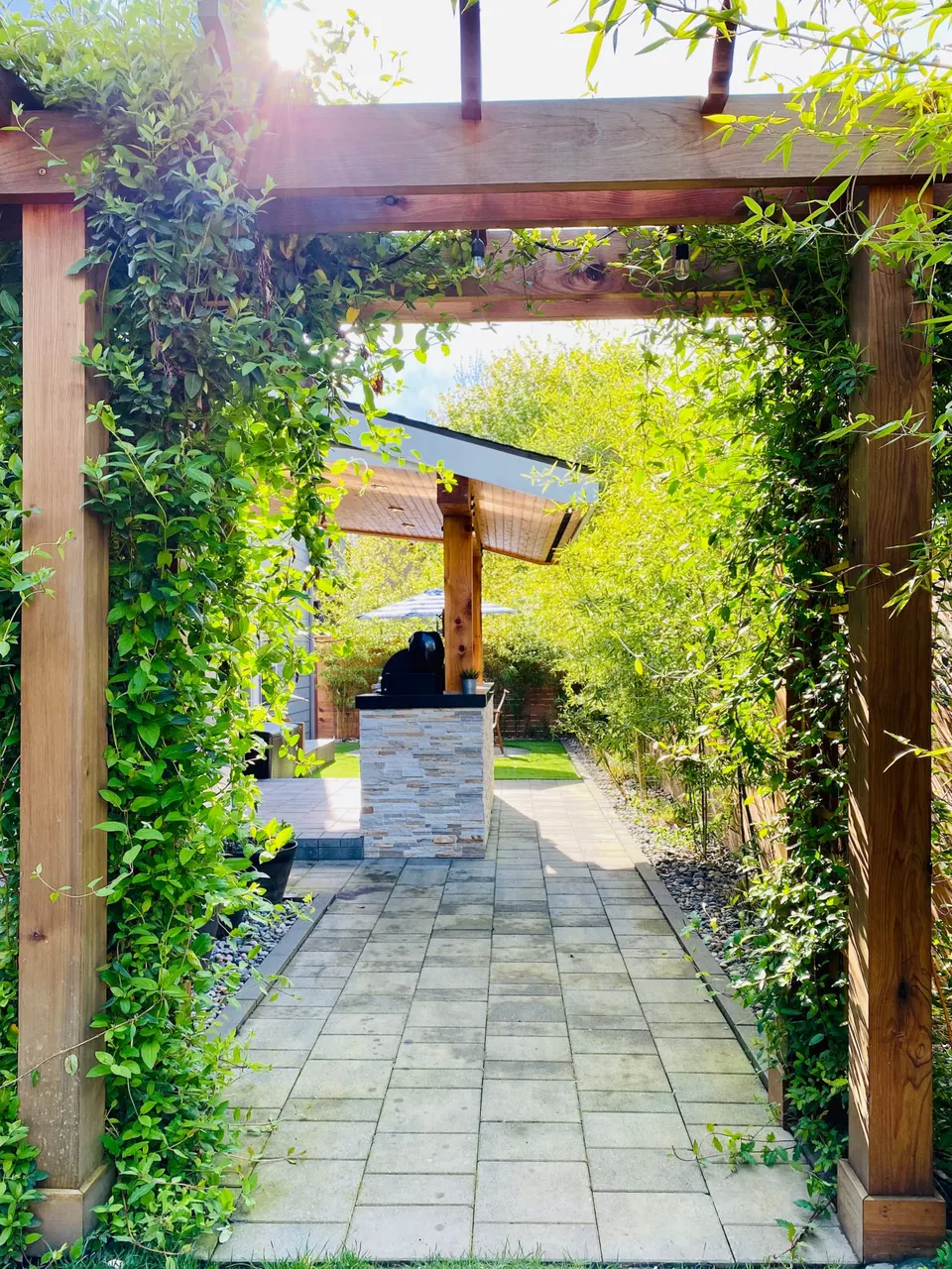 Backyard with outdoor kitchen: after